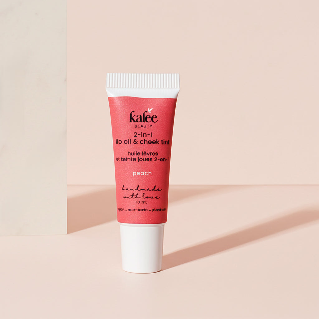Kalee Beauty Peach 2-in-1 Lip Oil & Cheek Tint ,handmade in a minimalist squeeze tube; vegan and gentle formula.