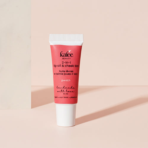 Kalee Beauty Peach 2-in-1 Lip Oil & Cheek Tint ,handmade in a minimalist squeeze tube; vegan and gentle formula.